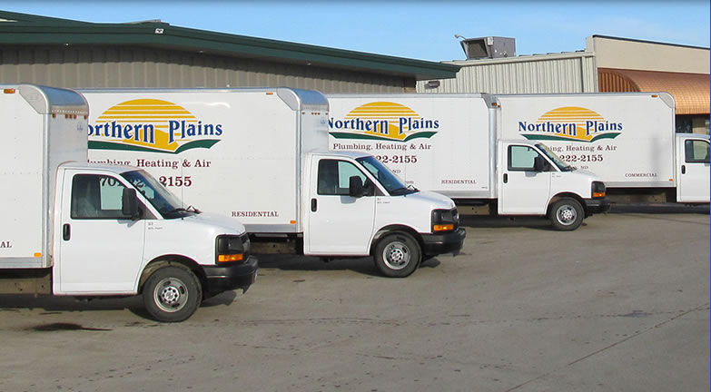 Northern Plains Plumbing team trucks